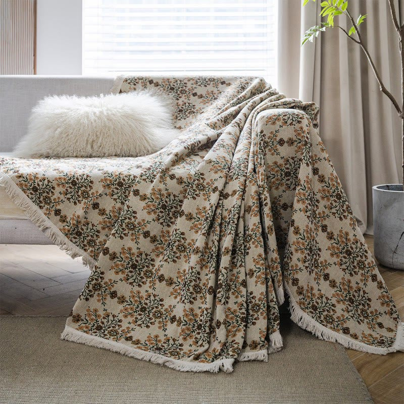 Sofabetræk med blomstermønster og kvaster i beige jacquard – 180 x 380 cm