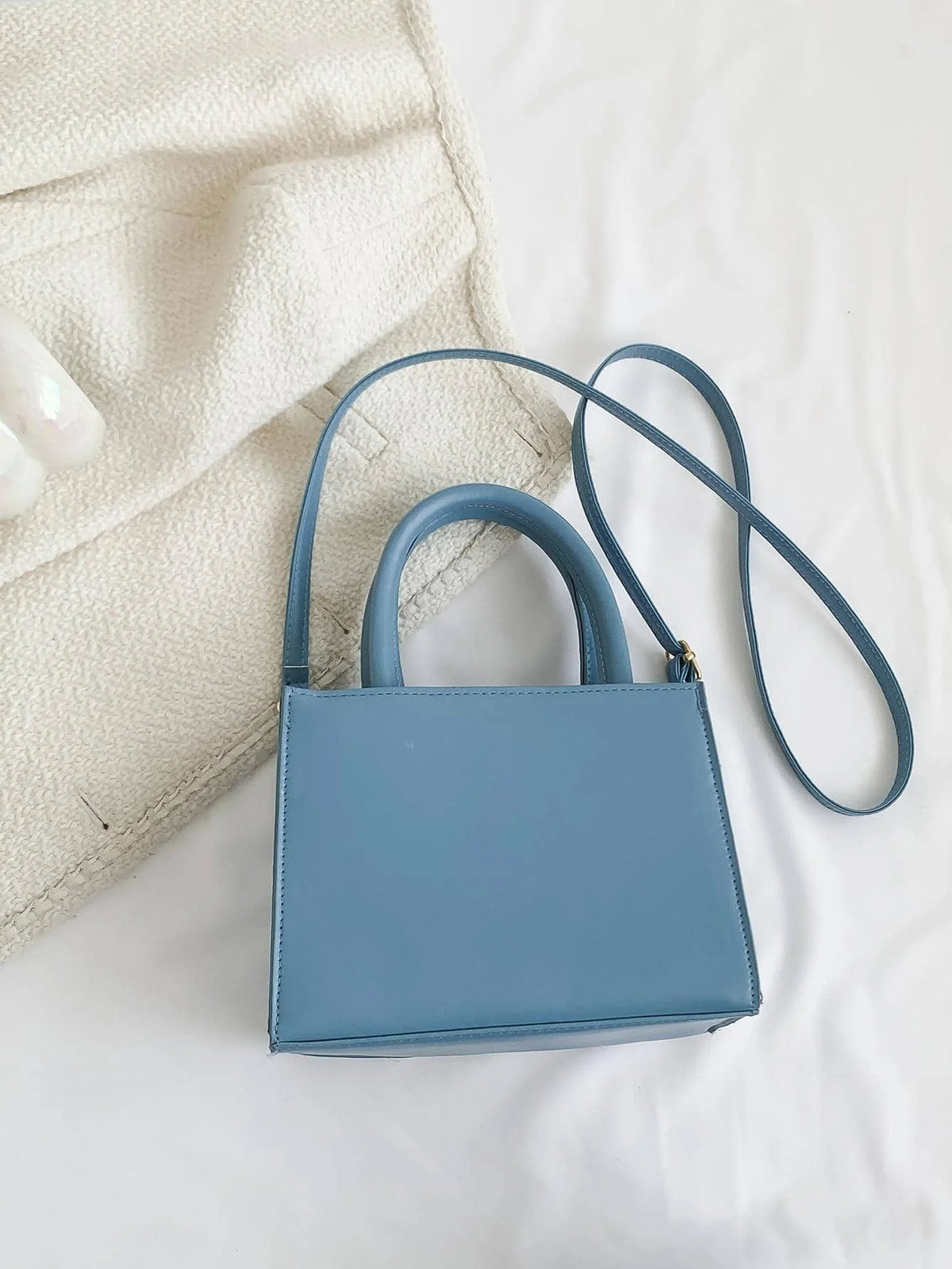 Mini crossbody taske i lyserød denim – forfra