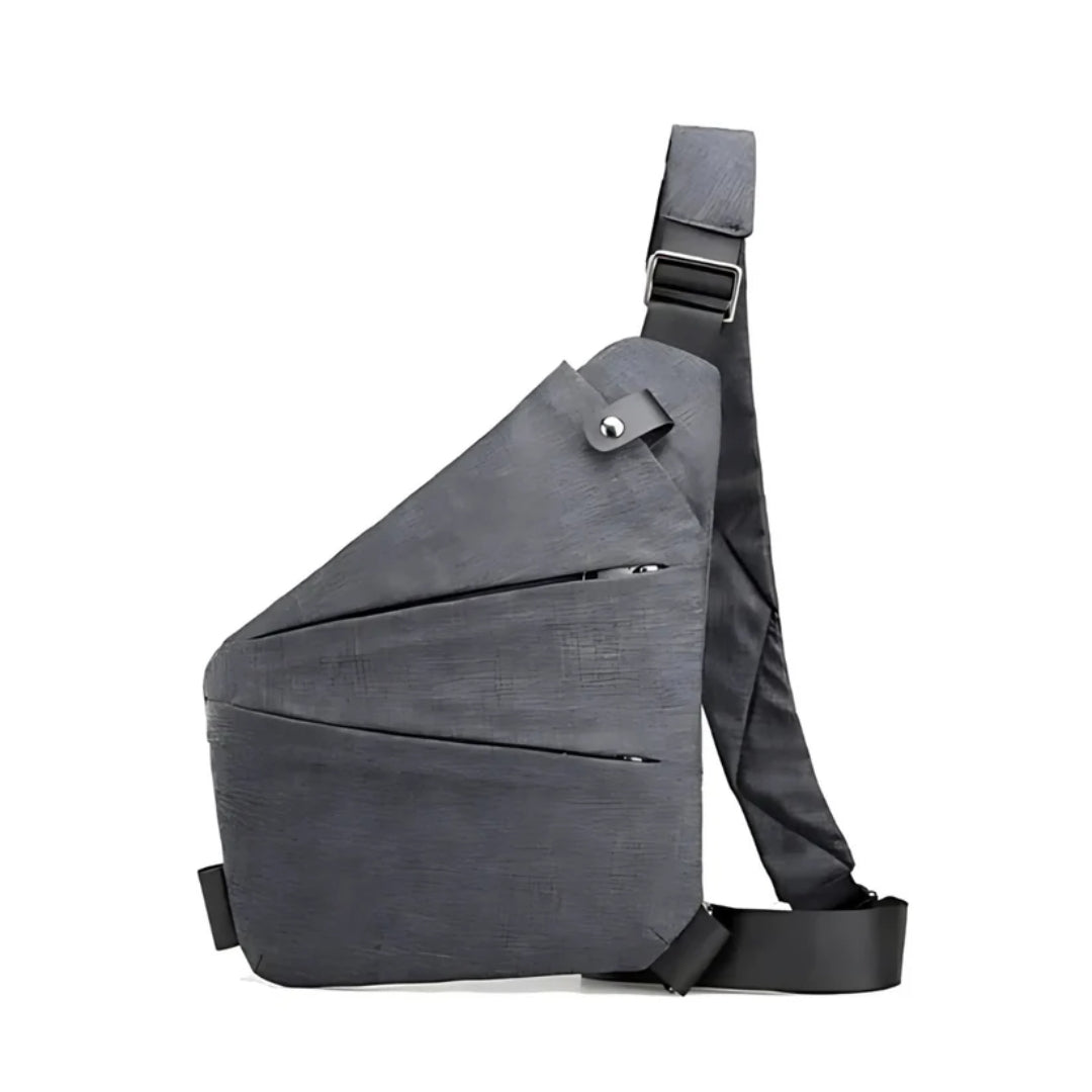 Kompakt crossbody taske med anti-tyveri design i grå farve