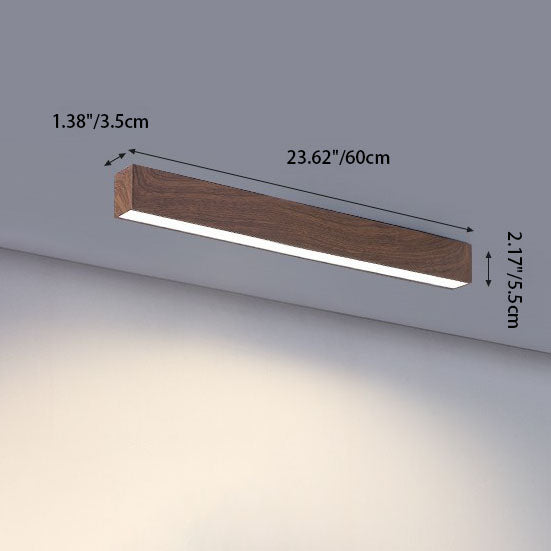 Loftlampe i lys træfarve i minimalistisk soveværelse