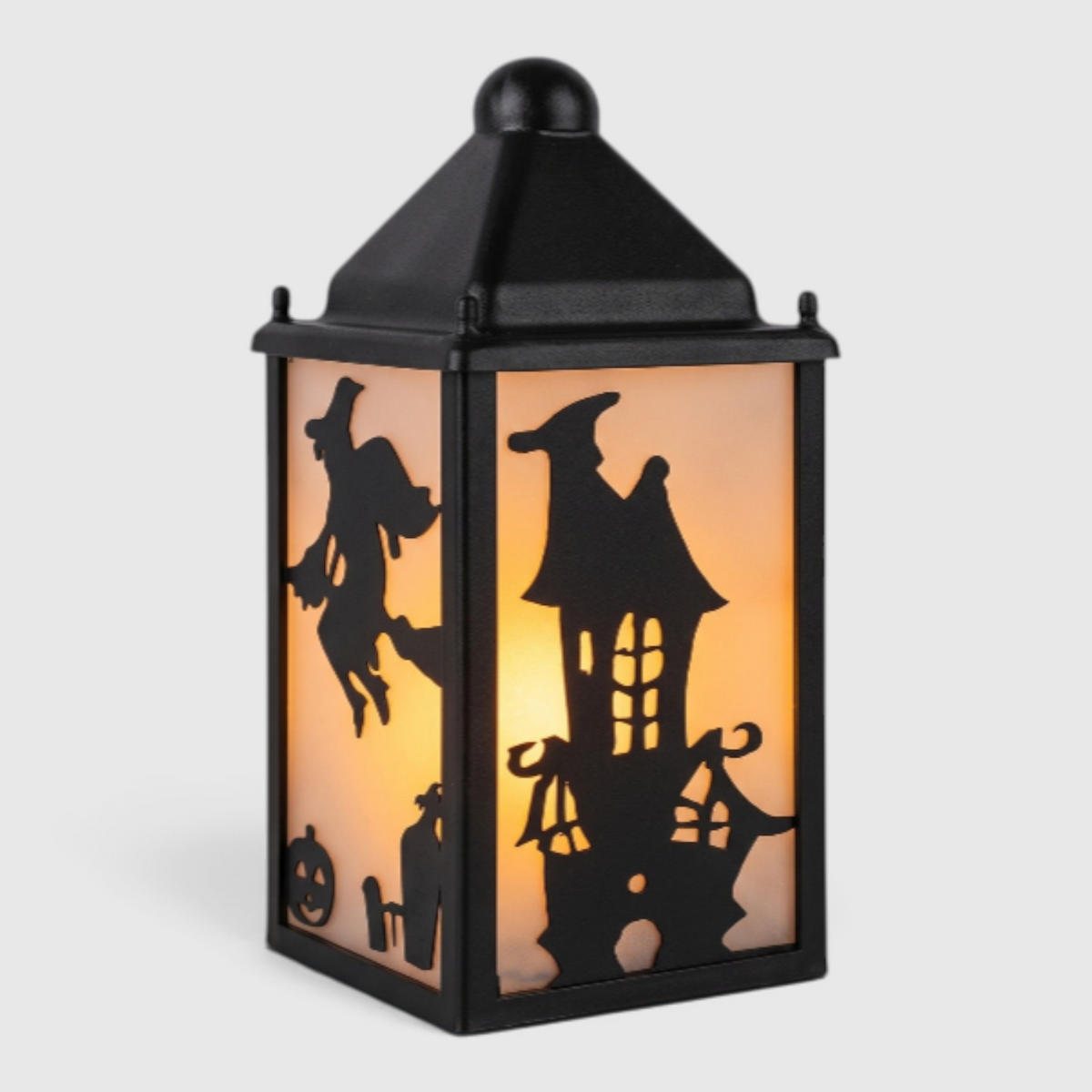Halloween lygteholder i sort med spøgelseshus-siluet og teeningslys