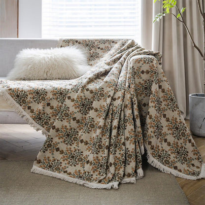 Sofabetræk med blomstermønster og kvaster i beige jacquard – 180 x 380 cm