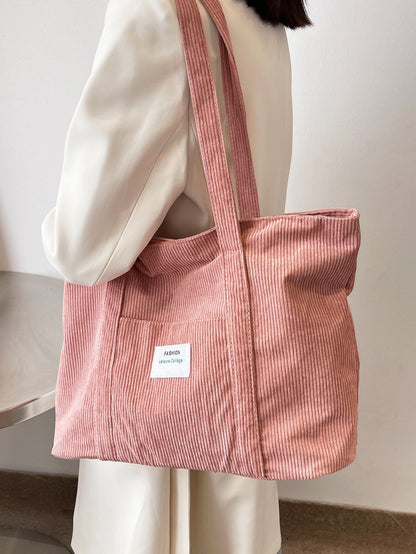 Stor tote bag med åbent hovedrum og god kapacitet