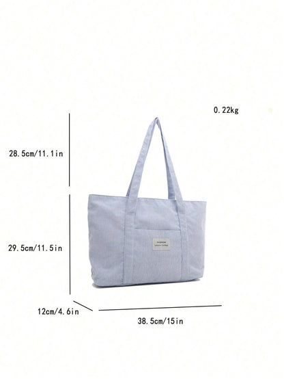 Rummelig corduroy stoftaske set forfra