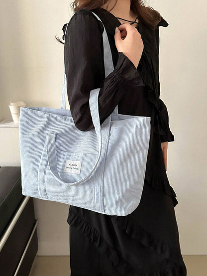 Sort stor tote bag i corduroy materiale