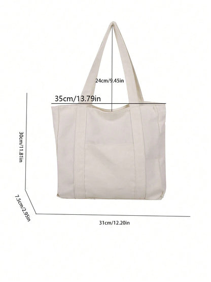 Skuldertaske i canvas med afslappet design