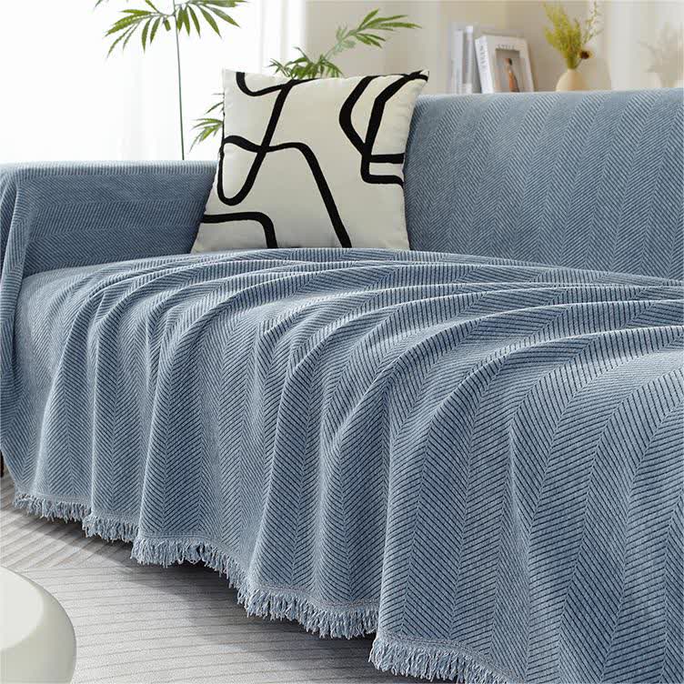 Sofacover i chenille med sildesbensmønster og kvaster