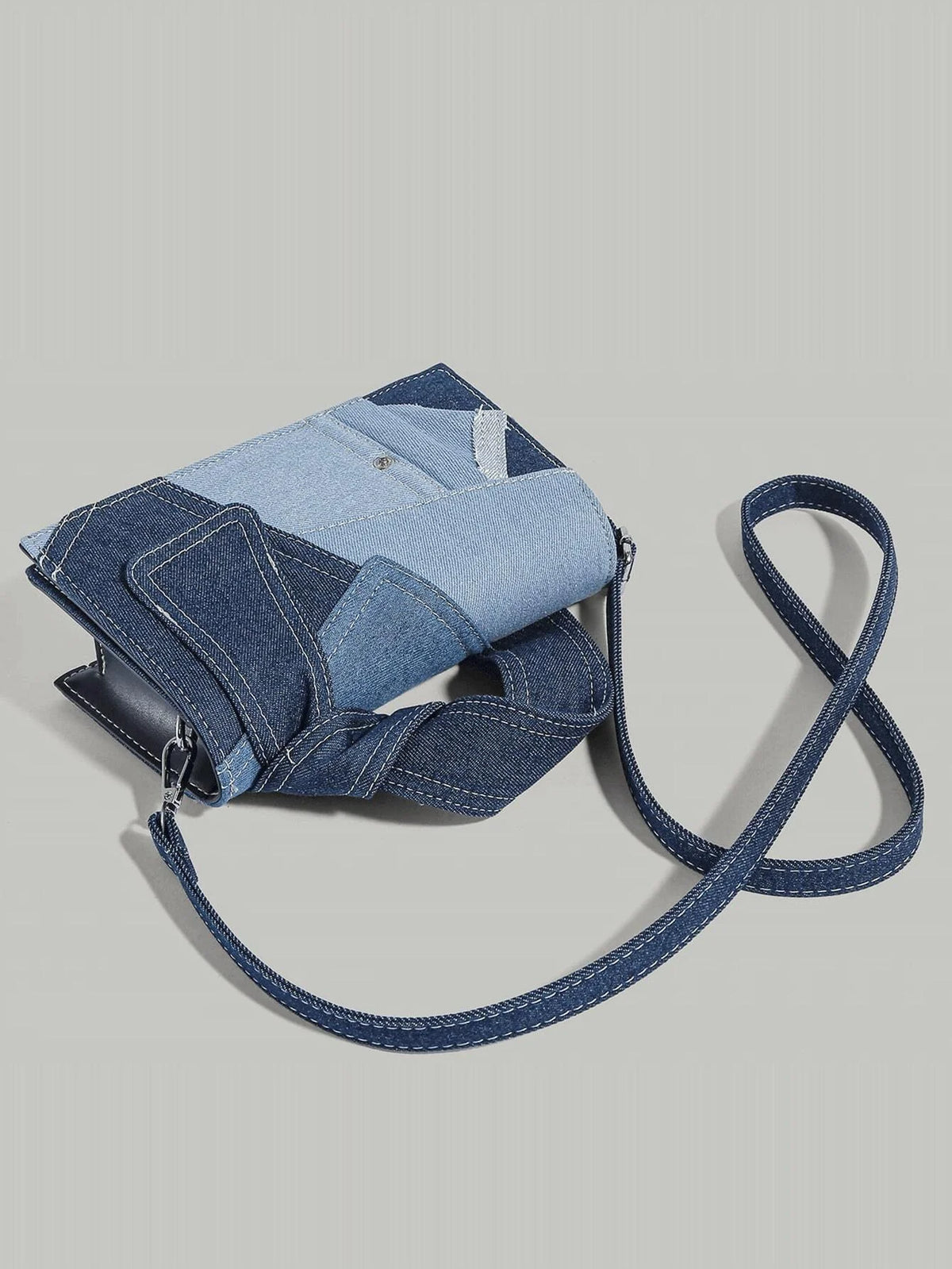 Lille skuldertaske i blå denim – crossbody til hverdagsbrug