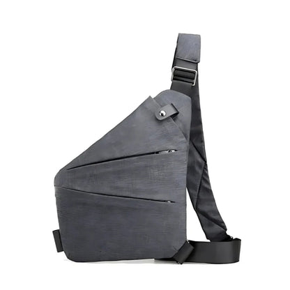 Kompakt crossbody taske med anti-tyveri design i grå farve