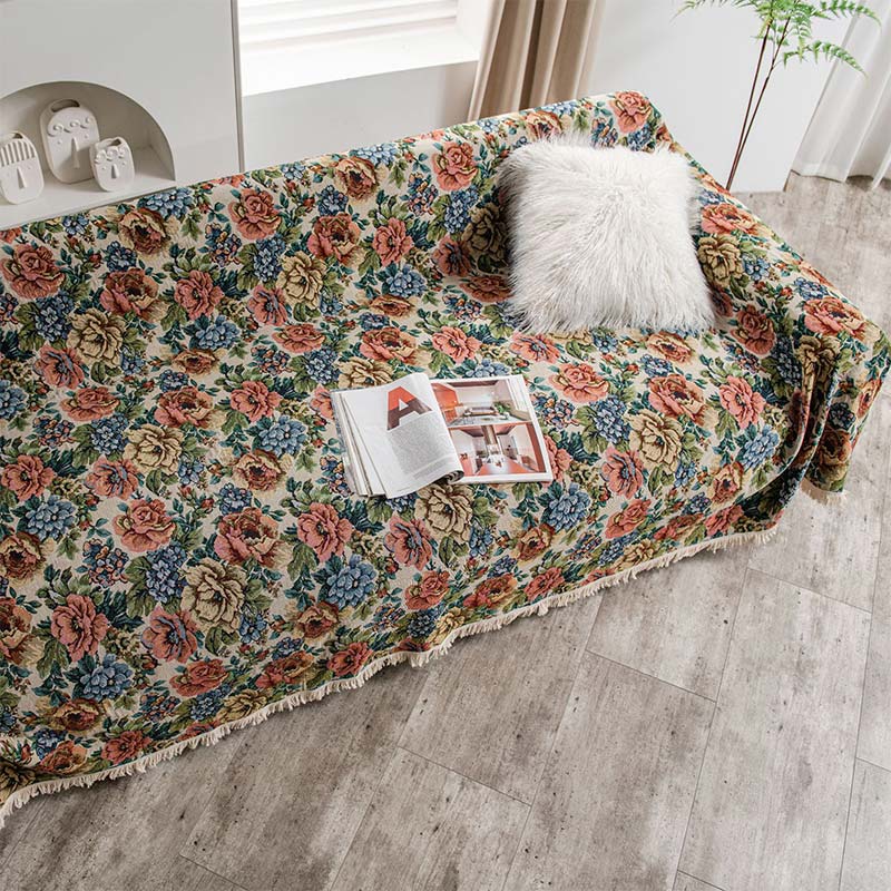 Sofacover med landligt rosenprint på L-sofa