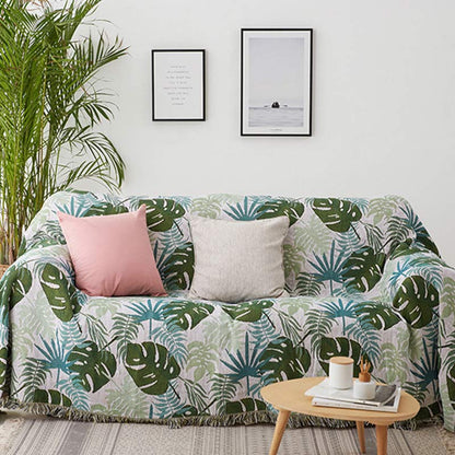 Tæppe til sofaen med palmemønster i stuen