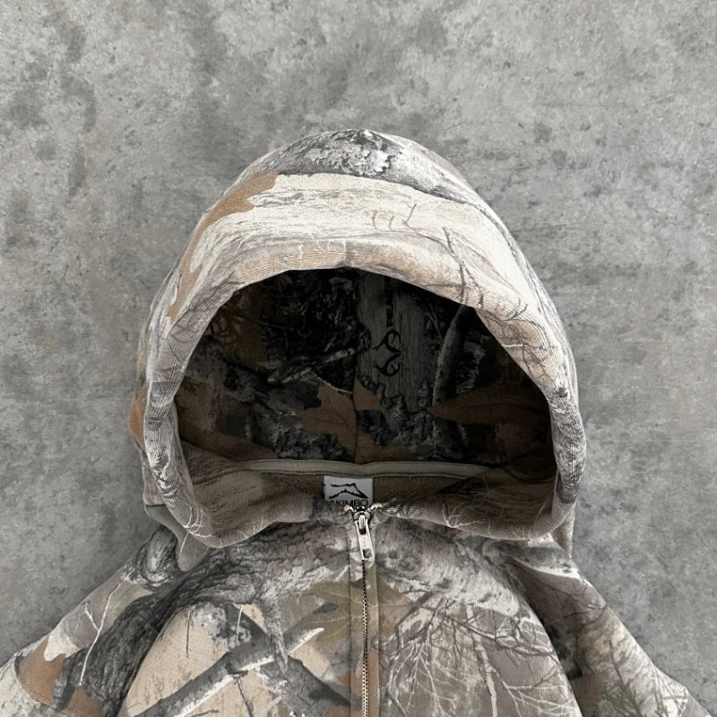 Vandafvisende lynlås på camouflage hoodie