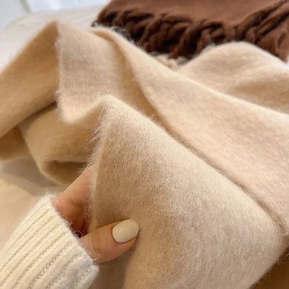 Nærbillede af kashmirfibrenes bløde tekstur