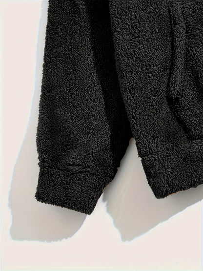Detalje af teddyfleece tekstur på herrepyjamas