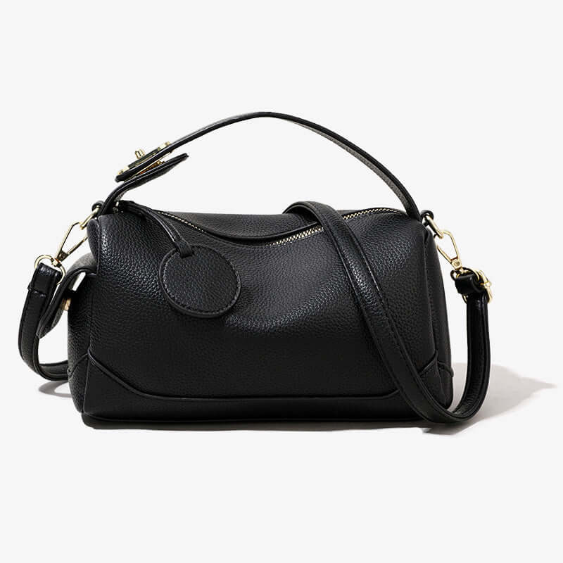 Dame crossbody taske med justerbar rem vist i detalje, mål 24x13x11 cm