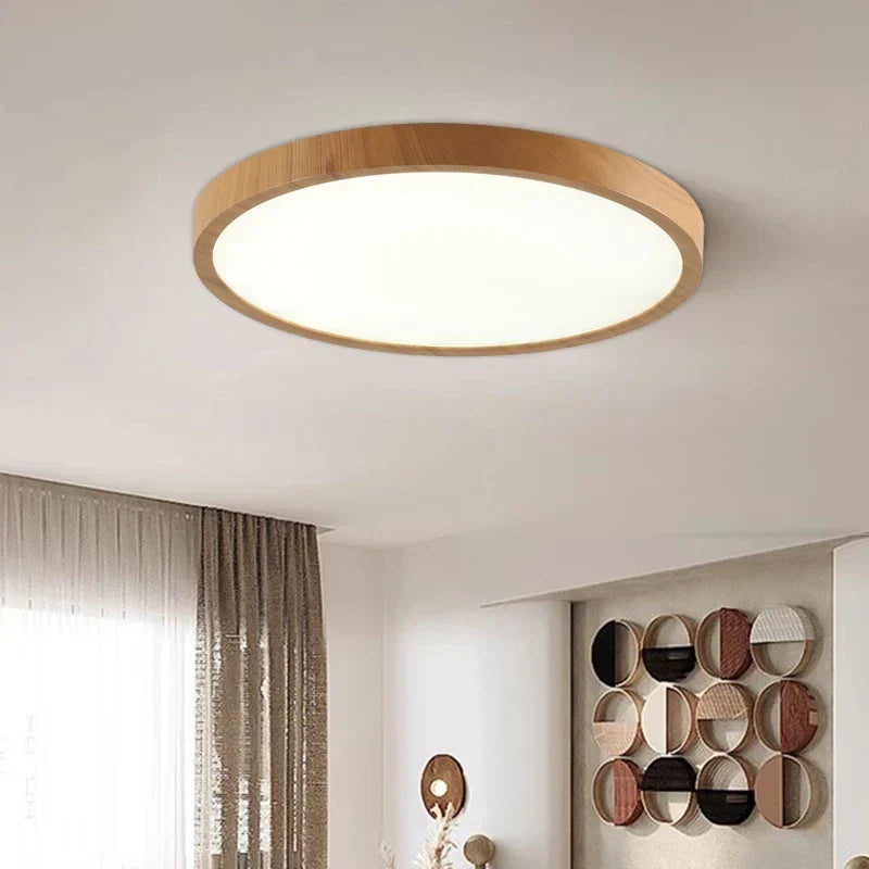 Rund ultraflad LED loftlampe med valnødetræfinish set nedefra