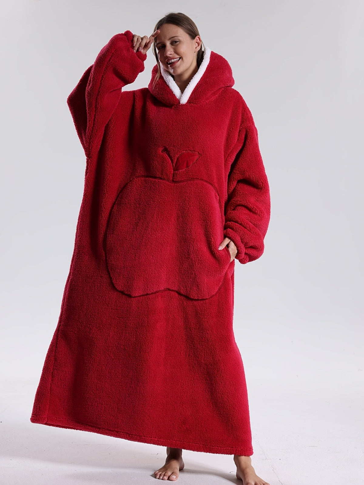 Oversized hoodie-tæppe med hætte vist bagfra